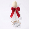 scented candle tulip with red ribbon label